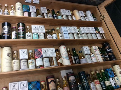 Lot 22 - Fine collection of Scottish single malt whiskies in display cabinet, believed to represent all but two of the Scottish distilleries