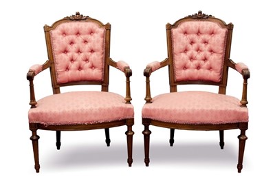 Lot 763 - Pair of late 19th / early 20th century French carved walnut button upholstered chairs