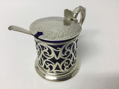 Lot 274 - Victorian silver mustard with blue glass liner