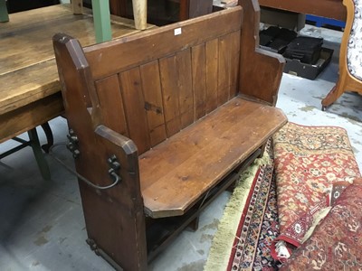 Lot 1020 - Small Victorian stained pitch pine pew with  Gothic iron side handles 110 cm wide