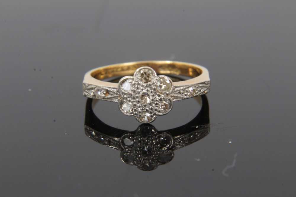 Lot 63 - 1920s diamond cluster ring with a daisy head cluster of single cut diamonds in platinum setting on 18ct yellow gold shank