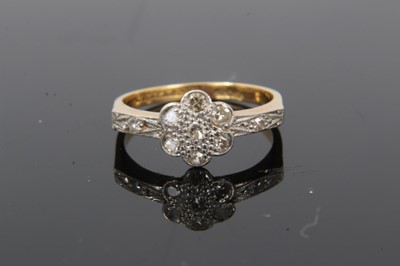 Lot 63 - 1920s diamond cluster ring with a daisy head cluster of single cut diamonds in platinum setting on 18ct yellow gold shank