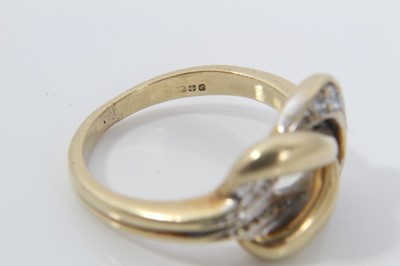 Lot 64 - 18ct gold and diamond knot ring