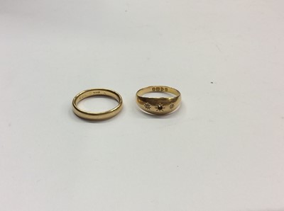 Lot 712 - 18ct gold wedding ring and an 18ct gold diamond gypsy ring (one stone missing)