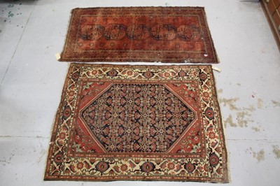 Lot 875 - Persian rug together with a Bokhara rug