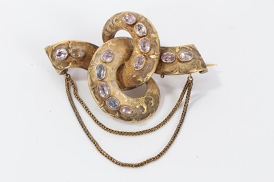 Lot 139 - Victorian gold scroll knot brooch with semi-precious pink stones in original fitted box