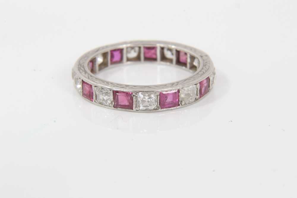 Lot 196 - Ruby and diamond eternity ring