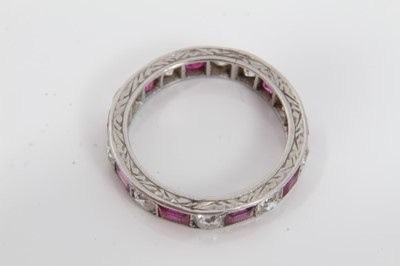 Lot 196 - Ruby and diamond eternity ring