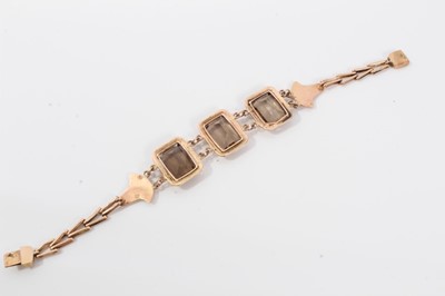 Lot 199 - Egyptian revival 14ct gold and smoky quartz bracelet