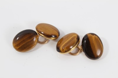 Lot 201 - Pair of Edwardian 18ct gold and tiger's eye cufflinks