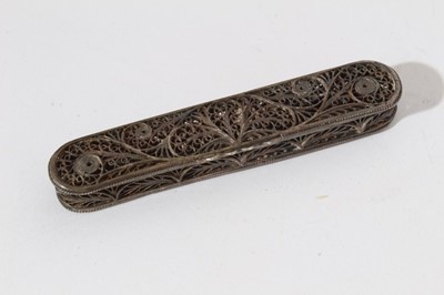 Lot 252 - 19th century white metal filigree work tooth pick / toothpaste case of oval form with hinged lid, 6.9cm in length