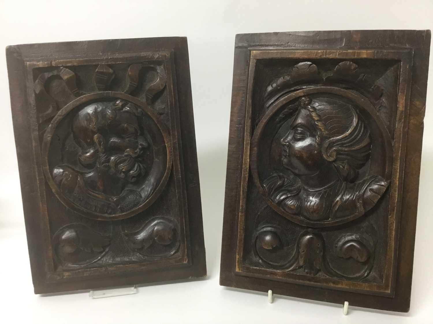 Lot 91 - Pair of Tudor style carved walnut panels