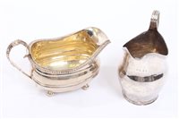 Lot 482 - George III silver cream jug of helmet form,...