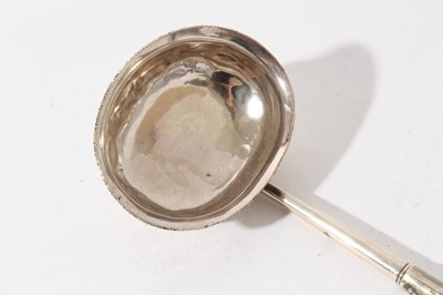 Lot 58 - Unusual early 19th century silver mounted toddy ladle, the bowl constructed from a hollowed out seed with a porcupine quill handle, together with another silver toddy ladle with whale bone handle