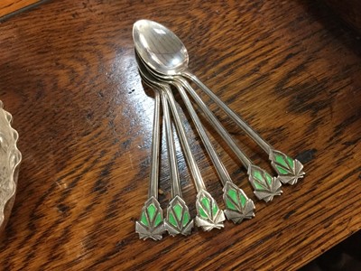 Lot 718 - Set of six silver and enamel coffee spoons