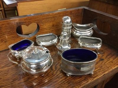 Lot 722 - Group of silver salts, pepperettes and a mustard pot (8 pieces)