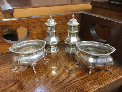 Lot 723 - Pair of silver pepperettes together with a pair of silver salts (4)