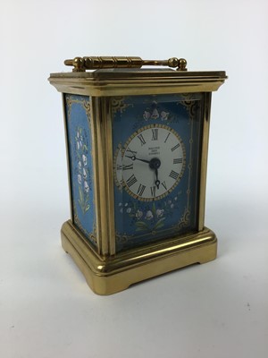 Lot 115 - Halcyon Days miniature enamel carriage clock with floral decoration on blue ground, 7.5cm high