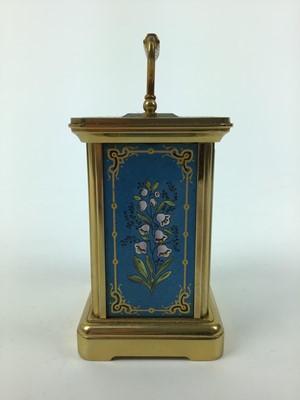 Lot 115 - Halcyon Days miniature enamel carriage clock with floral decoration on blue ground, 7.5cm high