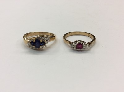 Lot 745 - 9ct gold diamond and sapphire crossover ring and 9ct gold ruby and diamond ring