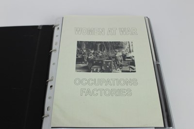 Lot 1074 - Women at War Uniformed Occupations and Factories.  Two albums of real photographic postcards and photographs of women in various job during war time.