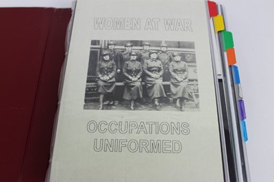 Lot 1075 - Women at War Uniformed Occupations.   An album of real photographic postcards and photographs large and small of women in various job during war time.