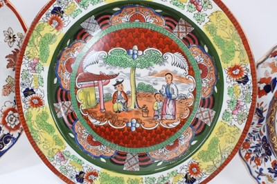 Lot 77 - A Masons Ironstone plate, in famille verte style, and five other Ironstone plates