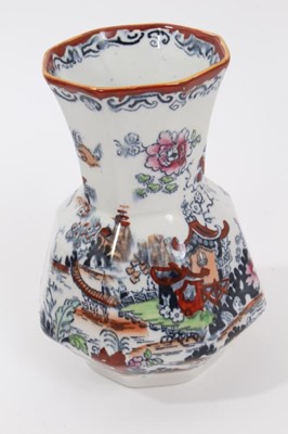 Lot 76 - A rare Masons Ironstone relief moulded jug, five other Masons jugs and two tooth brush vases