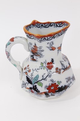 Lot 68 - A rare Masons Ironstone relief moulded jug, five other Masons jugs and two tooth brush vases