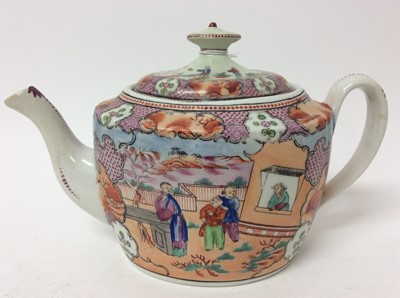 Lot 29 - A New Hall 'Boy at the Window' teapot and cover, and three similar coffee cups, a bowl and a tea bowl