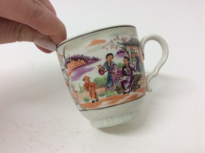 Lot 17 - A New Hall 'Boy at the Window' teapot and cover, three similar coffee cups and bowl