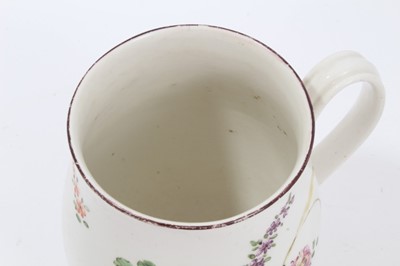 Lot 96 - A Derby barrel shaped mug, painted with flowers and wheatears, circa 1760