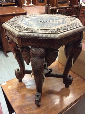 Lot 849 - Good quality Eastern carved occasional table with octagonal top and four elephant head supports