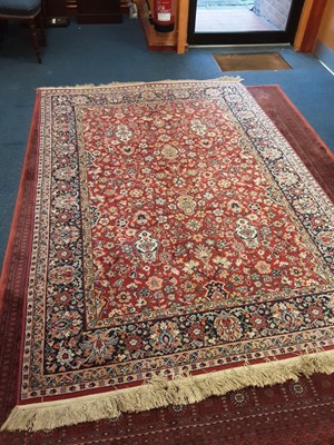 Lot 1111 - Eastern rug with geometric decoration on red and blue ground