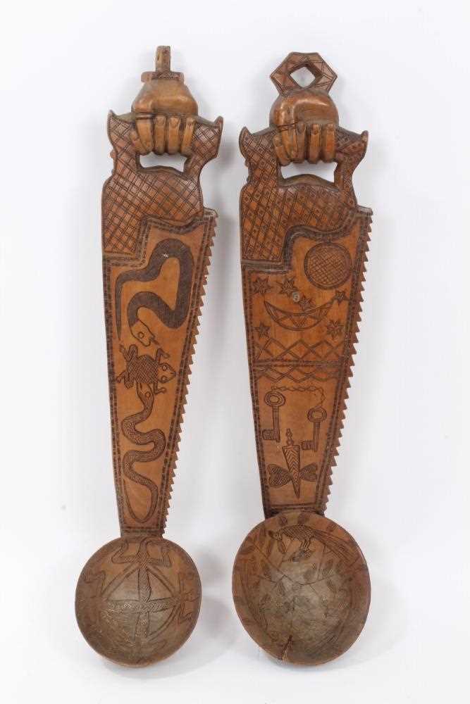 Lot 231 - Pair of African carved wooden ladles