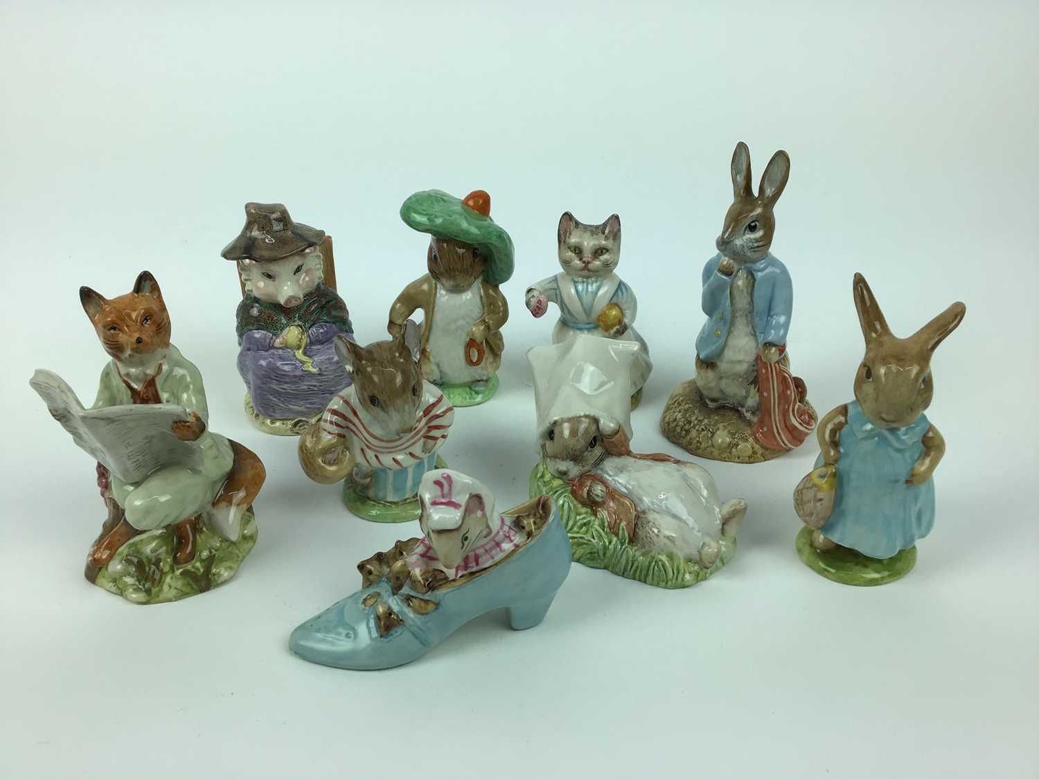Lot 182 - Five Beswick Beatrix Potter figures - Benjamin Bunny, Tabitha Twitchett, The Old Woman who lived in a Shoe, Mrs Flopsy Bunny and Mts Tittlemouse plus four Royal Albert Beatrix Potter figures - Foxy...