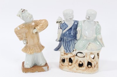 Lot 65 - Chinese Qianlong period porcelain group of the laughing twins