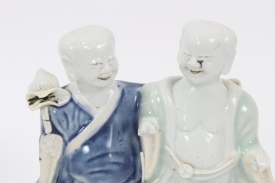 Lot 65 - Chinese Qianlong period porcelain group of the laughing twins