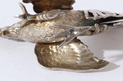 Lot 54 - Pair of silver models of fighting birds, London import hallmarks 1978, by Israel Freeman & Son Ltd