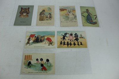 Lot 1086 - Postcards - Cats by Louis Wain including Brown Tabby Cat, An Amateur Reciter, It is Nice and Cool here etc (7) and other dressed cat cards early with undivided backs.