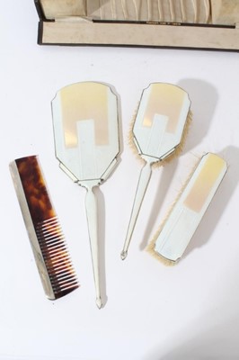 Lot 79 - 1930s Art Deco silver and guilloché enamel mounted ladies vanity set, comprising hand mirror and two brushes, (Birmingham 1936), maker Charles S Green & Co Ltd.