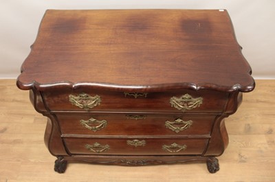 Lot 1307 - 19th century Dutch mahogany bombe commode chest, the shaped top above three long graduated drawers with brass handles and escutcheons, on carved claw and ball feet, 110cm at the widest point x 60cm...
