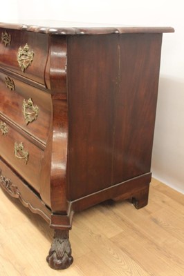Lot 1307 - 19th century Dutch mahogany bombe commode chest, the shaped top above three long graduated drawers with brass handles and escutcheons, on carved claw and ball feet, 110cm at the widest point x 60cm...
