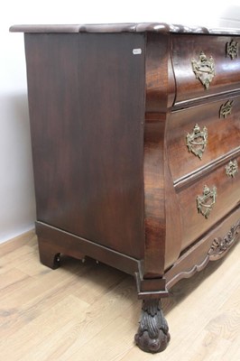 Lot 1307 - 19th century Dutch mahogany bombe commode chest, the shaped top above three long graduated drawers with brass handles and escutcheons, on carved claw and ball feet, 110cm at the widest point x 60cm...