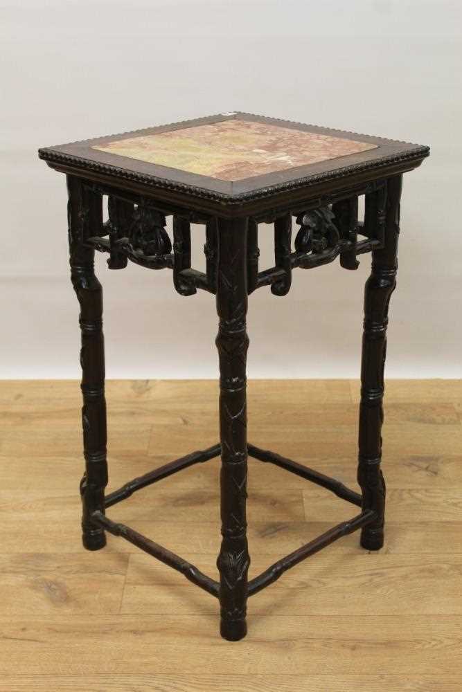 Lot 941 - Late 19th century Chinese hardwood simulated bamboo side table/jardinière stand, with inset rouge marble top, carved beaded border and bamboo formed supports joined by stretchers, 37cm square x 61c...