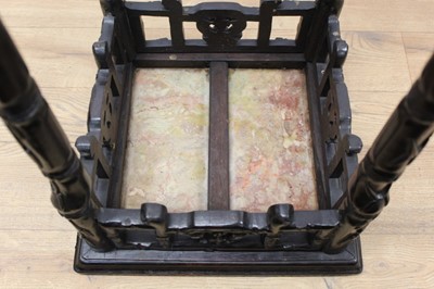Lot 941 - Late 19th century Chinese hardwood simulated bamboo side table/jardinière stand, with inset rouge marble top, carved beaded border and bamboo formed supports joined by stretchers, 37cm square x 61c...