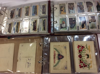 Lot 337 - Three albums of cigarette cards and WWI silk postcards