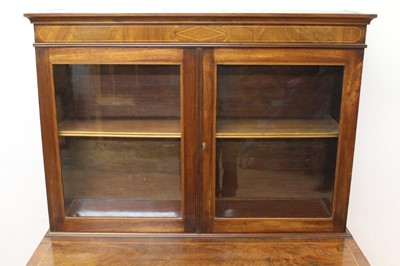 Lot 1020 - Good quality 19th century Sheraton revival vitrine cabinet on stand, the twin glazed doors enclosing a single shelf, with fitted drawer below containing a leather lined writing slide, on turned and...