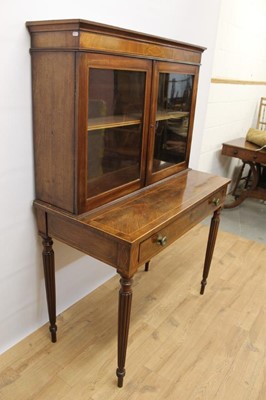 Lot 1020 - Good quality 19th century Sheraton revival vitrine cabinet on stand, the twin glazed doors enclosing a single shelf, with fitted drawer below containing a leather lined writing slide, on turned and...