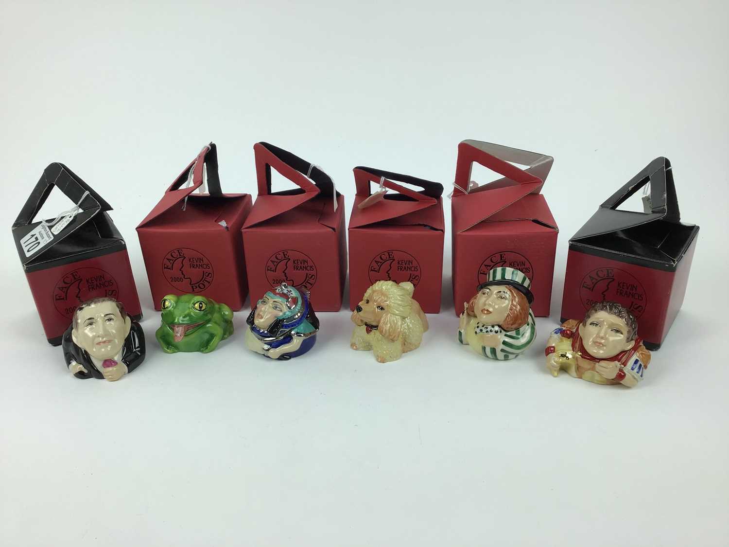 Lot 201 Sixteen Kevin Francis face pots